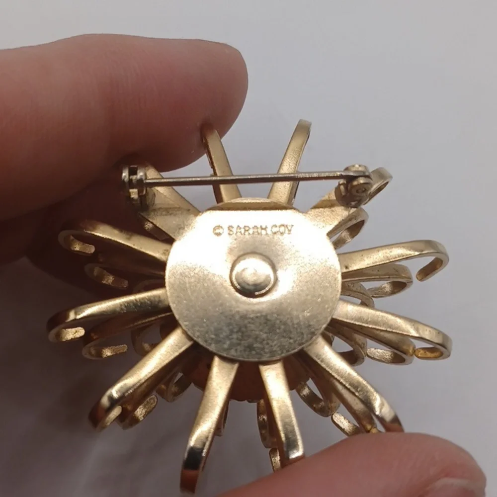 Sarah Coventry Gold-Tone Starburst Brooch with Blue Opalescent Rivoli Center - Picture 6 of 6